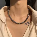 Lustrous Tahitian grey pearl necklace on neck, 8mm round beads with metallic finish - Tahitian Gray Size Eight