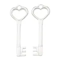 Twee zilveren vintage hartvormige sleutelhangers van legering met gepolijste afwerking - Antiek Zilver