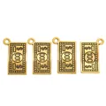 Detailed macro view of four vintage golden 100 dollar bill alloy charms for DIY jewelry - Antique Gold