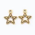 Macro detail of star-shaped hollow alloy pendants with beaded edges for DIY jewelry - Antique Gold