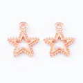Macro detail of rose gold hollow star pendants with beaded edges and top rings - Rose Gold