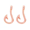 Detailed macro view of rose gold fishhook pendants with hole for DIY jewelry making - Rose Gold