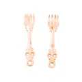 Macro shot of rose gold vintage fork charms with intricate floral engraving for DIY jewelry - Vintage Fork Style / Rose Gold