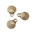 Three vintage bronze scallop shell charms for DIY jewelry making with top rings - Antique Bronze