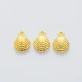 Three golden shell charms with radial textures and loops for DIY jewelry making - Gold