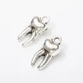 Set of two vintage silver alloy molar tooth charms with top hanging loops for DIY jewelry - Antique Silver