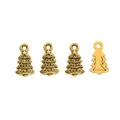 Detailed view of four golden zinc alloy Christmas tree charms for DIY jewelry making - Antique Gold