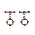 Macro detail of antique copper toggle clasps with woven texture for jewelry making - Antique Red Copper