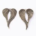 Vintage heart-shaped angel wing alloy pendants in antique bronze finish with feather textures - Antique Bronze