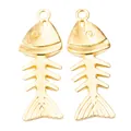 Vintage golden fish bone charms for DIY jewelry making with realistic skeleton detail - Gold