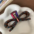 Brown bow hair claw clip with blue polka dots and contrasting pink accents - Bow Dark Brown Blue Polka Dot Style (F1720 Blue Dot)