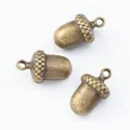Three vintage bronze acorn charms made of alloy for DIY necklace and jewelry making - Acorn Shape / Antique Bronze