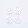 Macro detail of four silver-plated bear paw hollow charms for DIY jewelry making - Bright Silver