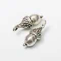 Pair of vintage silver metal acorn pendants with realistic texture for DIY jewelry making - Acorn Shape / Antique Silver