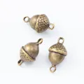 Three antique bronze pine cone charms with dual loops for DIY jewelry connectors - Antique Bronze