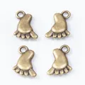 Set of four vintage zinc alloy baby feet charms in antique bronze finish for DIY jewelry - Antique Bronze
