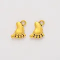 Detailed view of vintage gold baby feet pendants with antique texture for DIY jewelry - Antique Gold