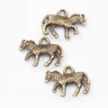Set of 3 vintage bronze zebra pendants with detailed stripes for DIY jewelry making - Antique Bronze