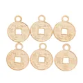 Detailed macro view of vintage zinc alloy Chinese coin pendants with hanging loops - KC Gold