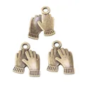 Three vintage bronze-style metal hand charms for DIY jewelry making on white background - Bronze
