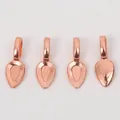 Detailed view of four teardrop-shaped rose gold metal pendant trays for DIY jewelry making - Rose Gold