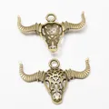 Vintage bronze bull head skull pendant charms with hollow pattern for DIY jewelry - Antique Bronze