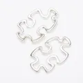 Pair of vintage silver alloy puzzle piece connector pendants with hollow design - Antique Silver