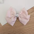 Pink satin bow hair clip with silver heart center decoration for elegant styling - Satin Bow With Heart Decor / Pink