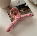 Detailed view of handmade colorful yarn wrapped hair claw clip with cozy wool texture - Rose Red