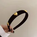 French vintage black velvet headband featuring three golden metal heart charms - Gold Heart Black Velvet