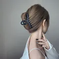 Elegant large matte black hair claw clip for bun styling with minimalist cross-line design - Crisscross Small / Black