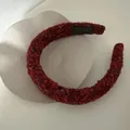 Detailed view of burgundy plush headband texture with handmade gold letter label - Black and Red Plaid Headband