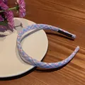 Blue and pink checkered fabric headband with handmade label on white plate - Blue Plaid