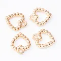 Set of four gold heart-shaped beaded alloy charms for DIY jewelry making accessories - KC Gold