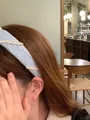 Light blue pleated fabric headband with double rows of pearls on female model - Light Blue