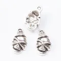 Three vintage silver skull pendants made of zinc alloy for DIY jewelry making and crafts - Skull Style / Antique Silver