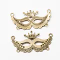 Vintage bronze alloy masquerade mask pendants with crown detail for DIY jewelry making - Antique Bronze