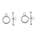 Close-up of vintage silver alloy OT toggle clasps for DIY jewelry making and connectors - White K/Silver