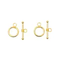 Close-up of golden alloy toggle clasps for DIY jewelry making and necklaces - Gold