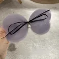 Detail of lavender mesh butterfly hair clip with black ribbon and white pearl drop - Dark Gray