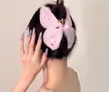 Détail de la pince à cheveux papillon rose élégante avec ailes en tulle et strass - Rose