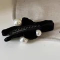 Velvet banana hair clip featuring white pearls and elegant black ribbon finish - Black Flocked Bow Pearl Banana Clip
