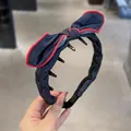 Cerchietto retrò blu navy con grande fiocco e denti antiscivolo per capelli da donna - Denim