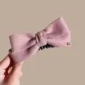 Dusty pink wool bow banana clip with golden metal emblem for high ponytail hairstyles - Pink