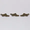 Vintage bronze sneaker alloy pendants with intricate textured details for DIY jewelry making - Antique Bronze