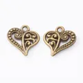 Retro bronze heart-shaped pendants with vintage filigree patterns for DIY jewelry making - Antique Bronze