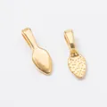 Vintage alloy pendant buckles set with smooth and hammered metal texture finishes - Gold