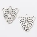 Two vintage silver leopard head charms for DIY jewelry making with intricate openwork detail - Antique Silver
