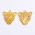 Pair of gold leopard head charms with intricate hollow patterns for DIY jewelry making - Gold
