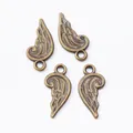 Set of four vintage bronze wing pendants in zinc alloy for DIY jewelry making crafts - Antique Bronze